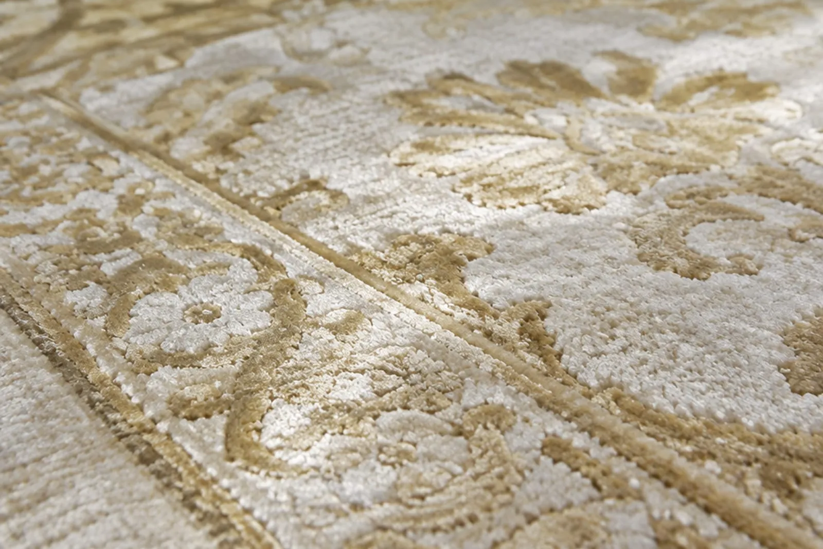 Close-up of a silk rug with a soft sheen
