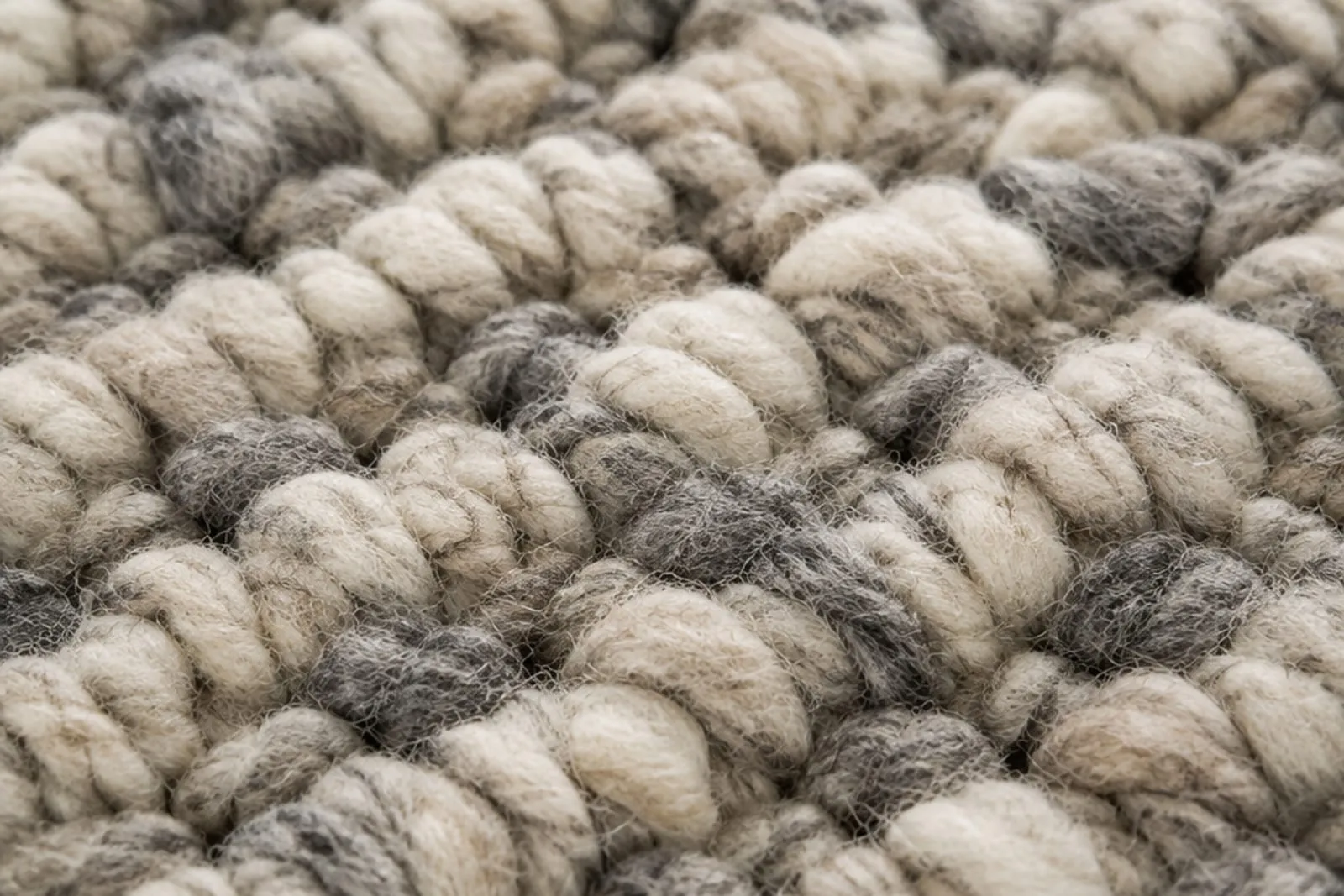 Close-up of a thick wool rug pile